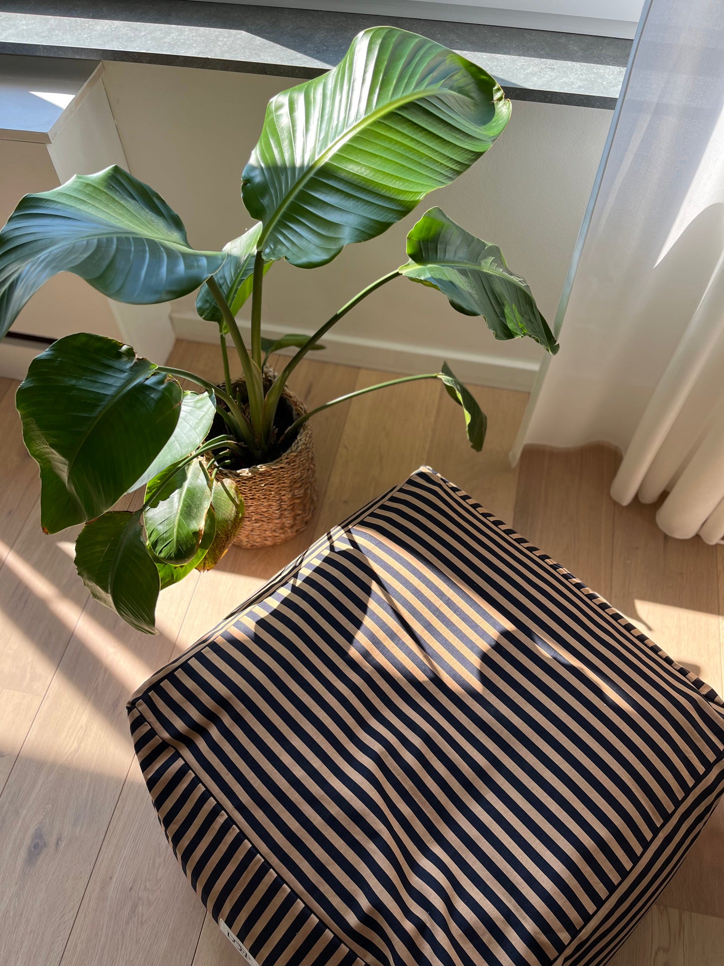 Beige striped pouf