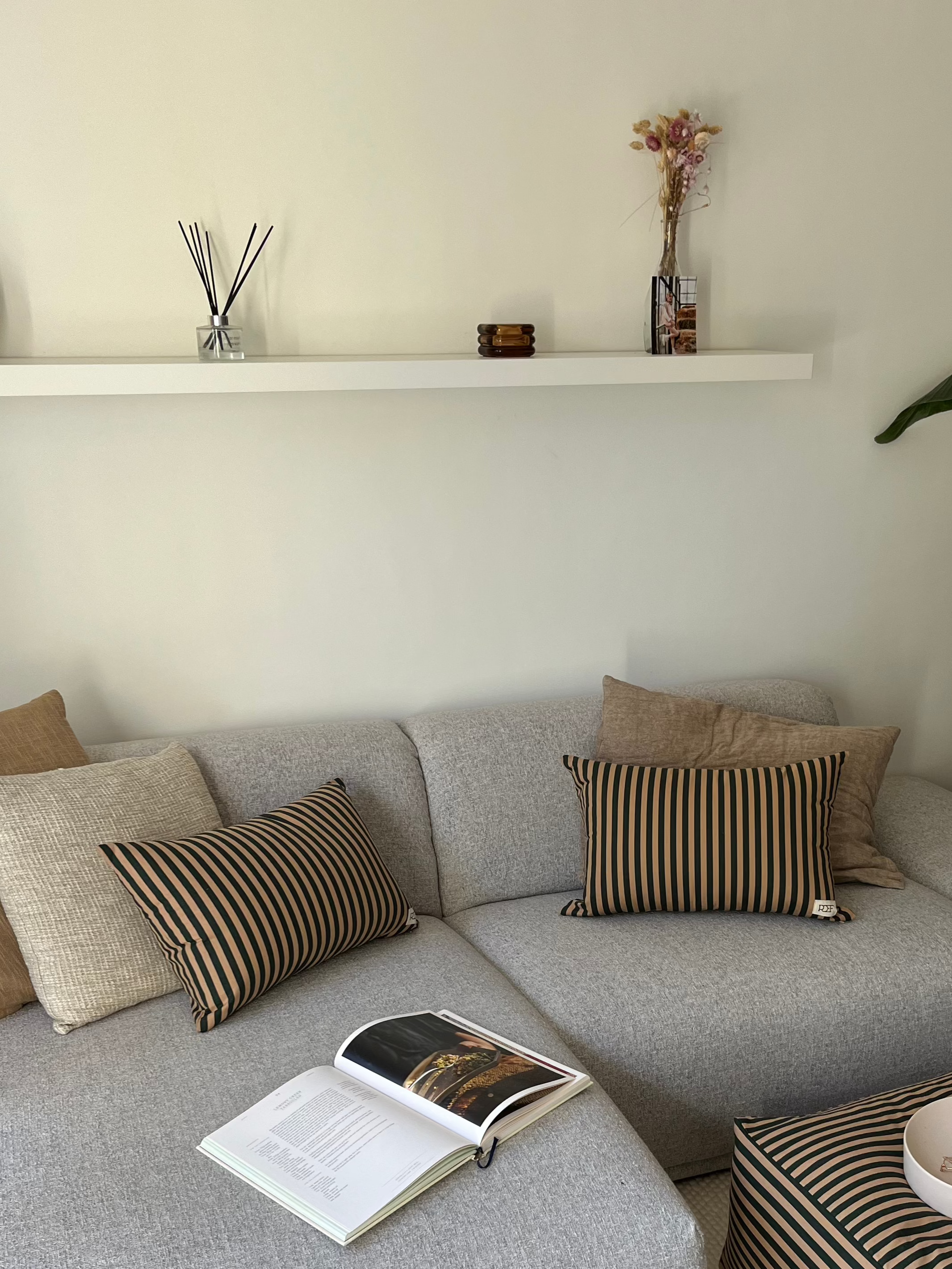 Olive striped cushion