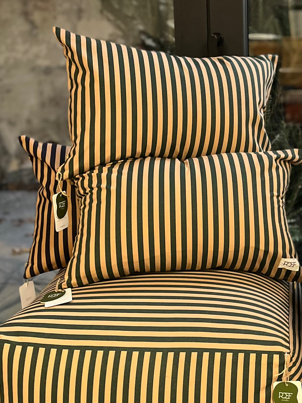 Olive striped cushion