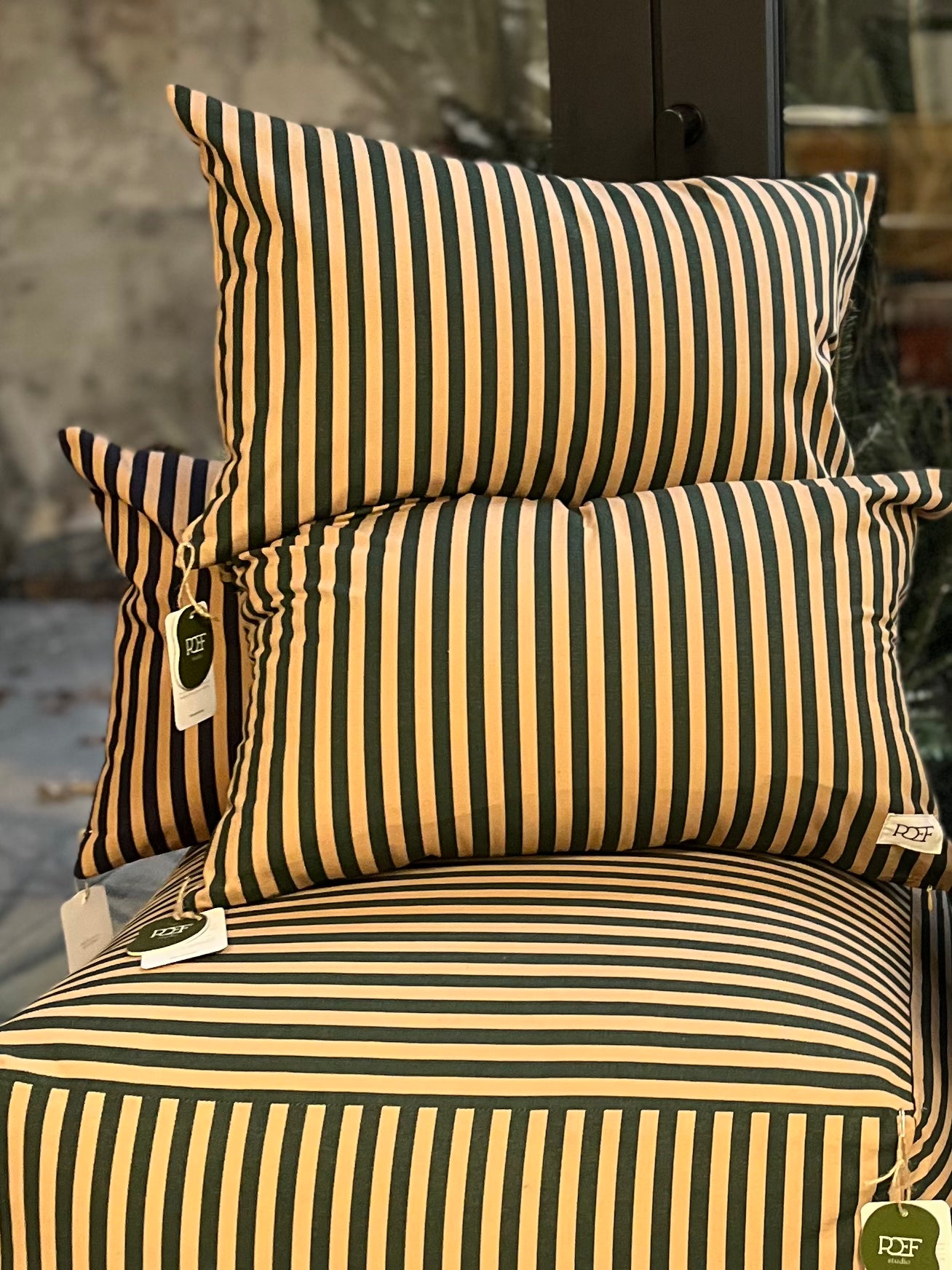 Olive striped cushion